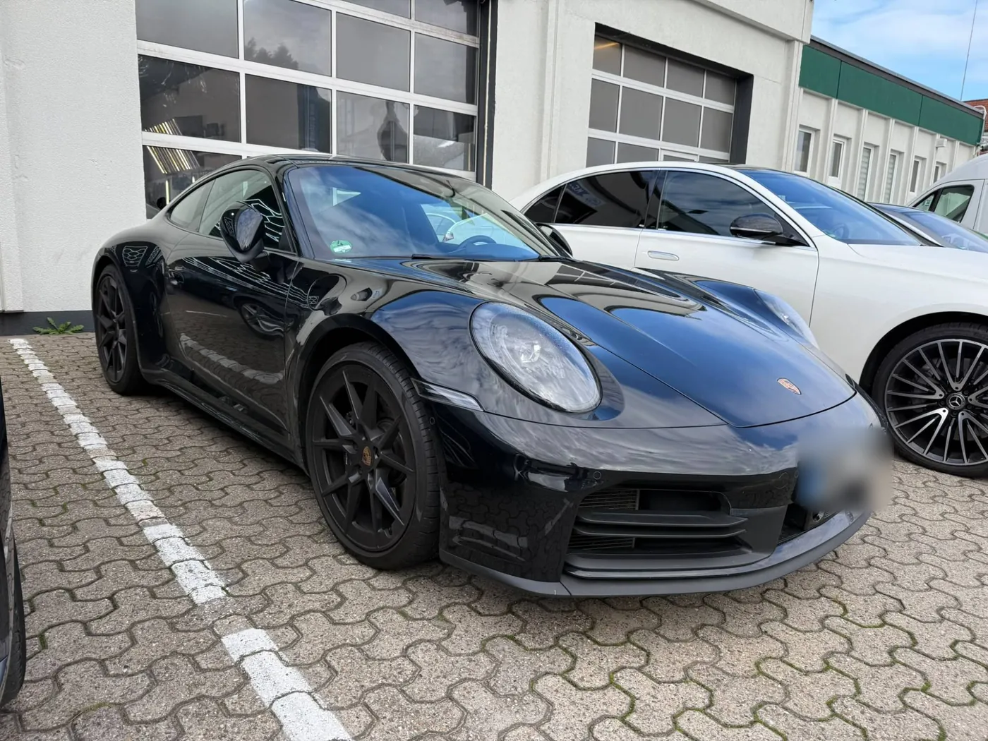 Wertgutachten Porsche 911 – CAR EXPERTISE Schwarzer Porsche 911 bei der Fahrzeugbewertung durch CAR EXPERTISE